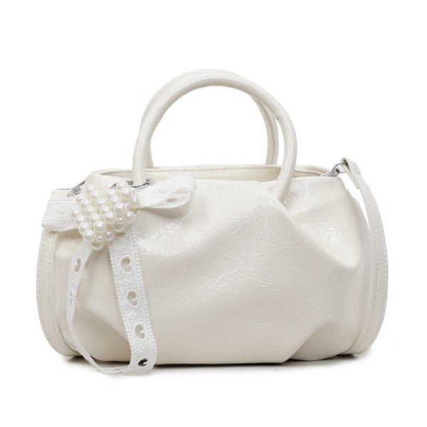 8f3afb46-42b3-45a1-876d-0fe511a19a6e Portable Solid-Color Cloud-Style Fashion Handbag