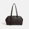 Versatile, high-capacity handbag suitable for commuting